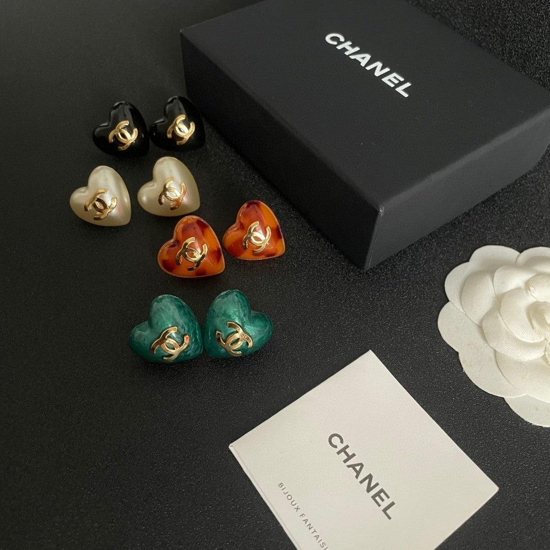 Double-C Emblem Stud Earrings in Polished Metal-Tone – Heart Detail – Design 014 side detail