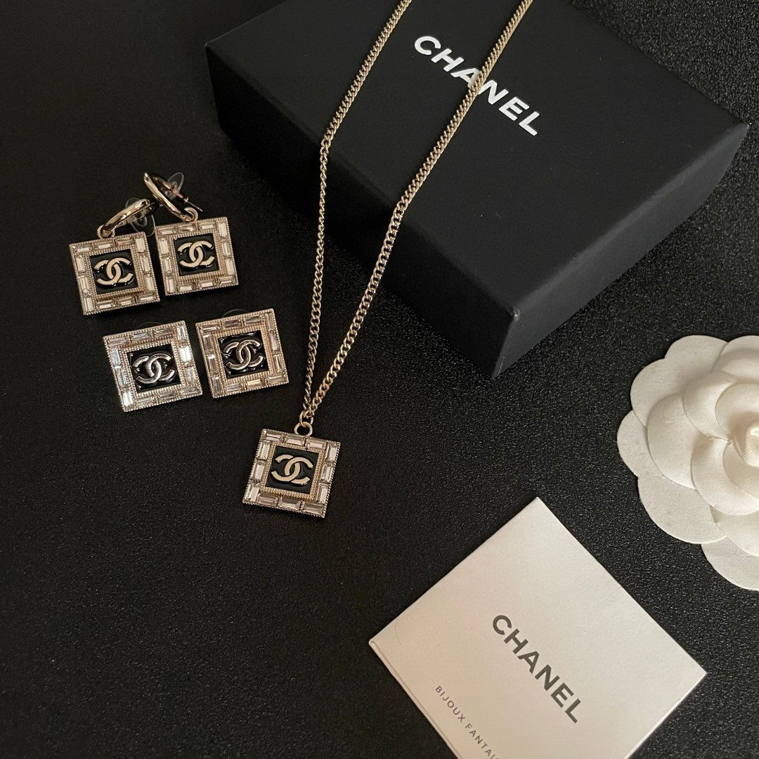 Double-C Emblem Statement Earrings in Polished Metal-Tone – Design 047 close-up detail