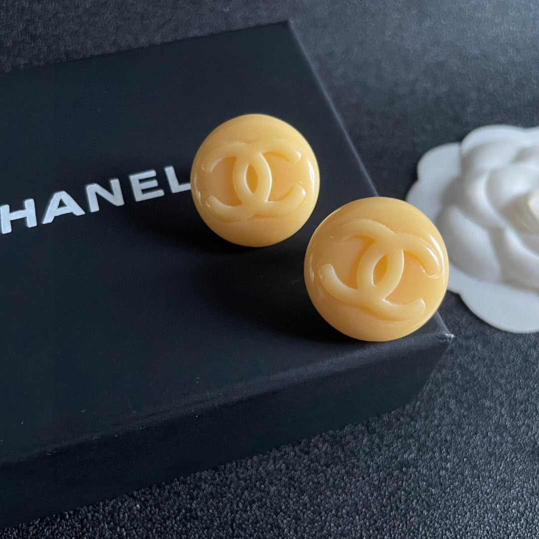 Double-C Emblem Stud Earrings in Polished Metal-Tone – Design 227 detail view