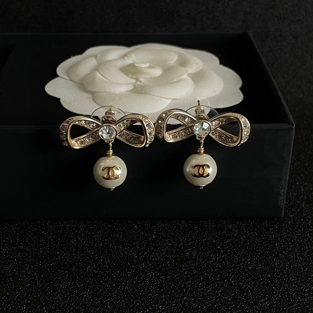 Bow Pearl-Detail Statement Earrings detail view