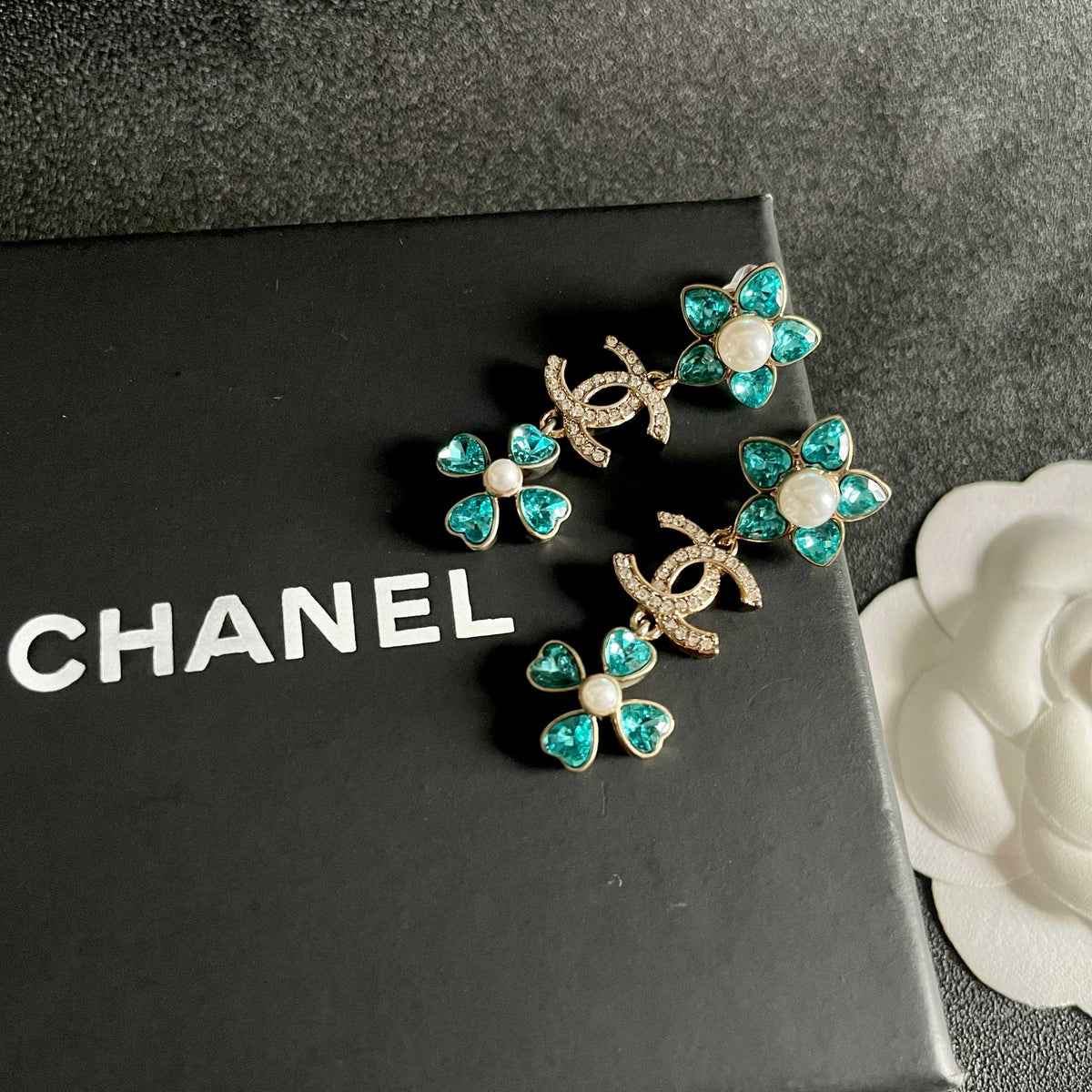 Signature Emblem Stud Earrings in Polished Metal-Tone – Design 046 detail view