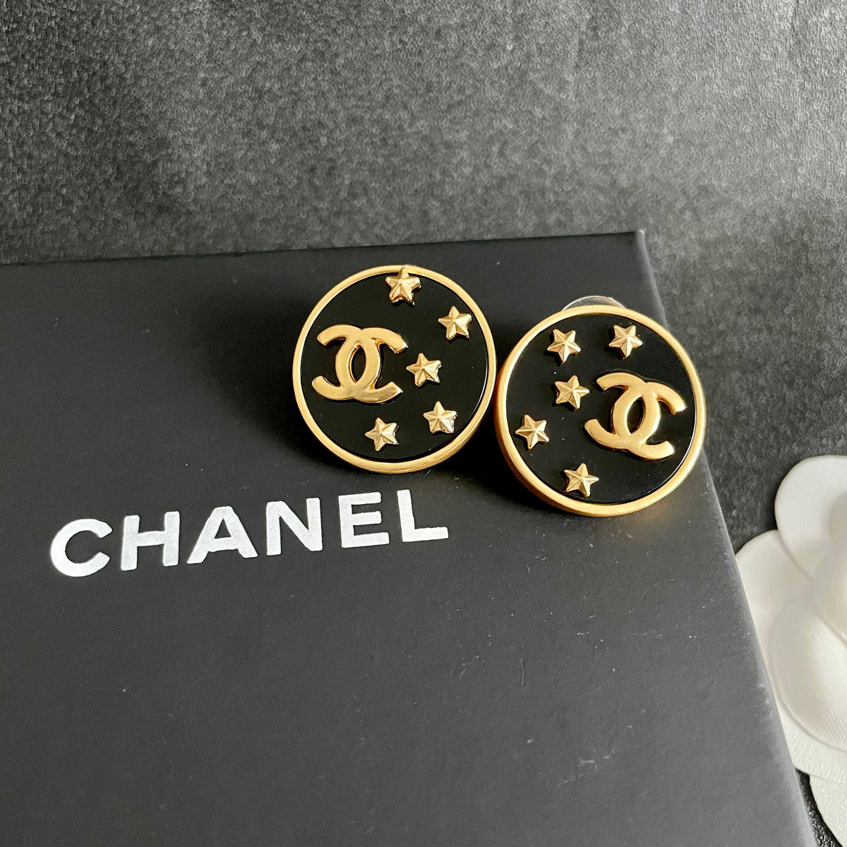 Double-C Emblem Stud Earrings in Polished Metal-Tone – Star Detail – Design 007 detail view