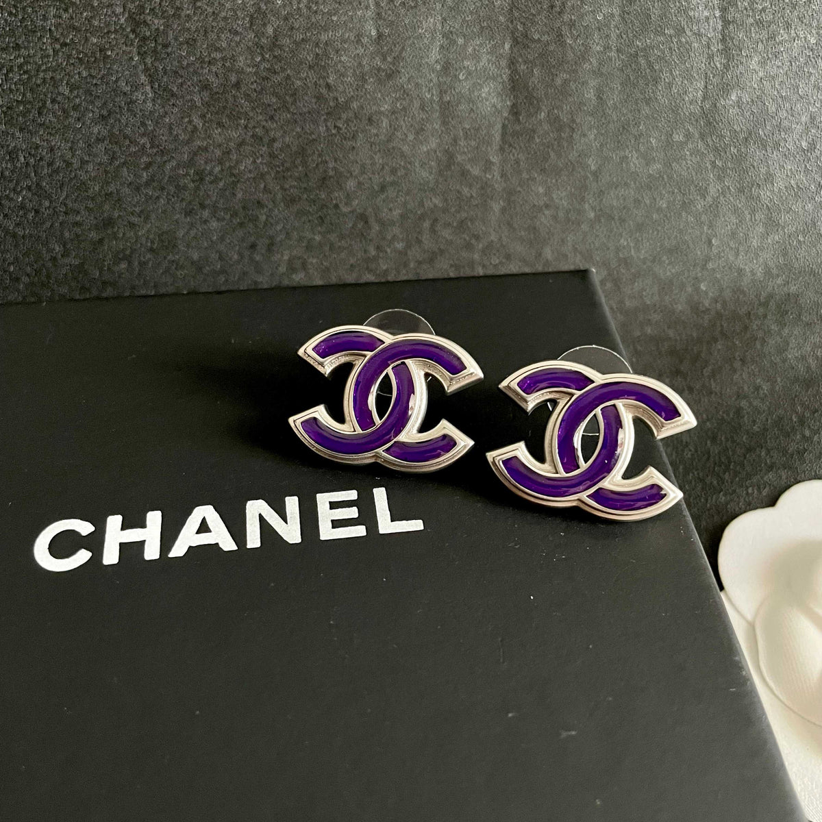 Double-C Emblem Stud Earrings in Polished Metal-Tone – Design 314 detail view