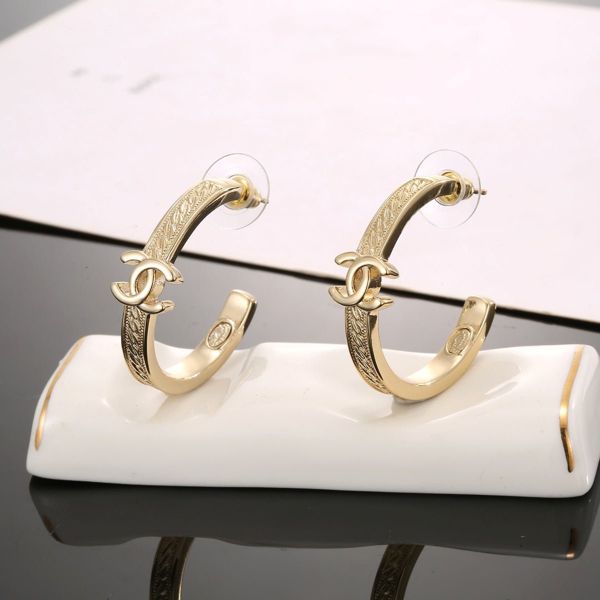 Signature Emblem Stud Earrings in Polished Metal-Tone – Design 018 styled product view