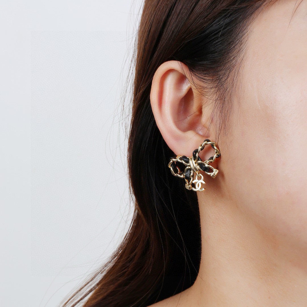 Bow Statement Earrings in Polished Metal-Tone – Design 002 front product view