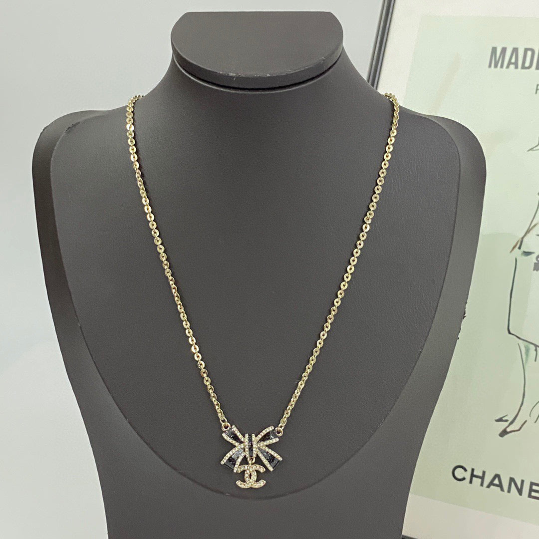 Bow Pendant Necklace in Black-Tone styled product view