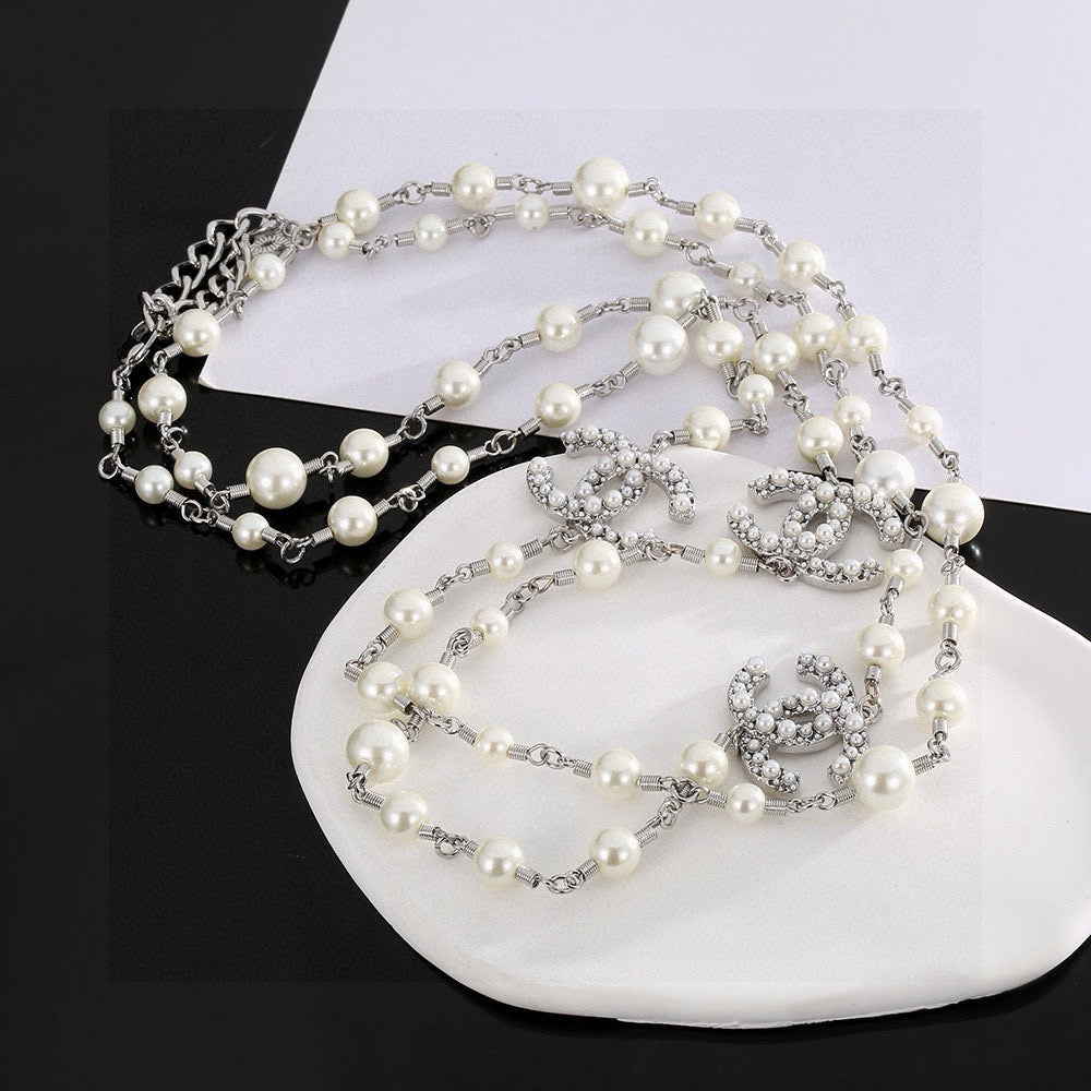 Double-C Emblem Pearl-Detail Pendant Necklace – Pearl Detail – Design 096 detail view