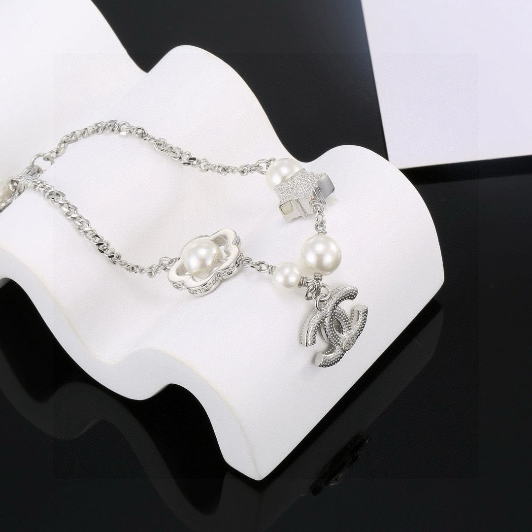 Camellia Bracelet in Polished Metal-Tone – Pearl Detail – Design 003 detail view