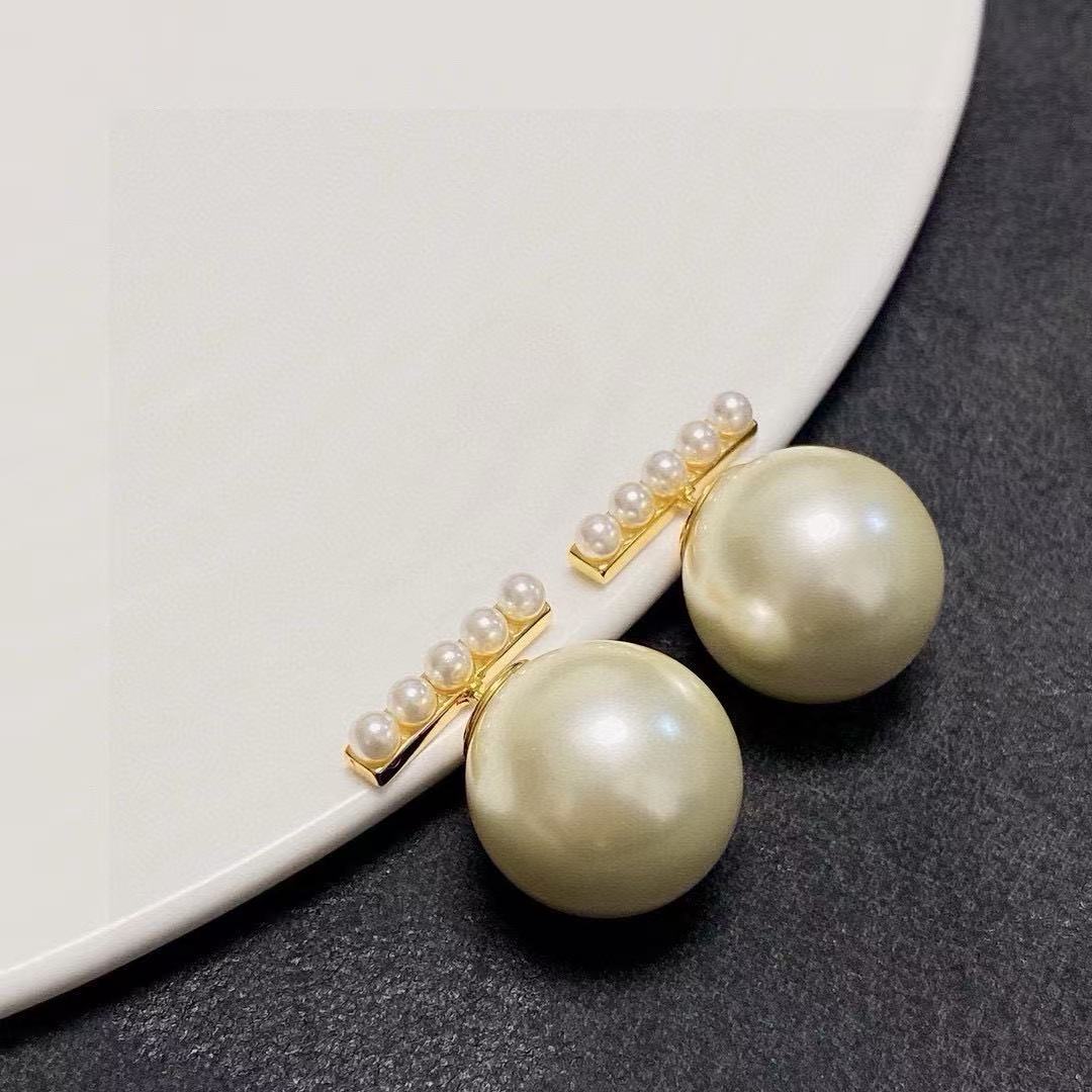 Signature Emblem Pearl-Detail Stud Earrings – Pearl Detail detail view