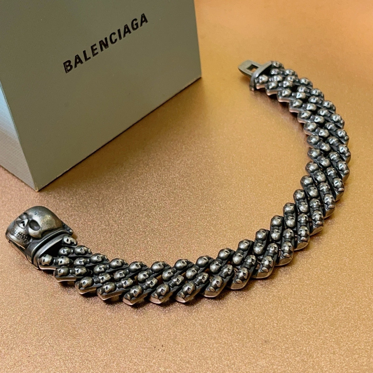 Geometric Emblem Bracelet in Polished Metal-Tone – Vintage Detail detail view