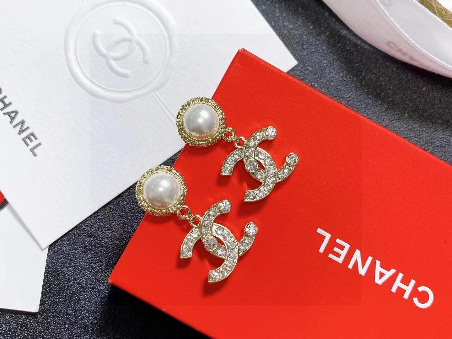 Double-C Emblem Stud Earrings in Polished Metal-Tone – Design 466 styled product view