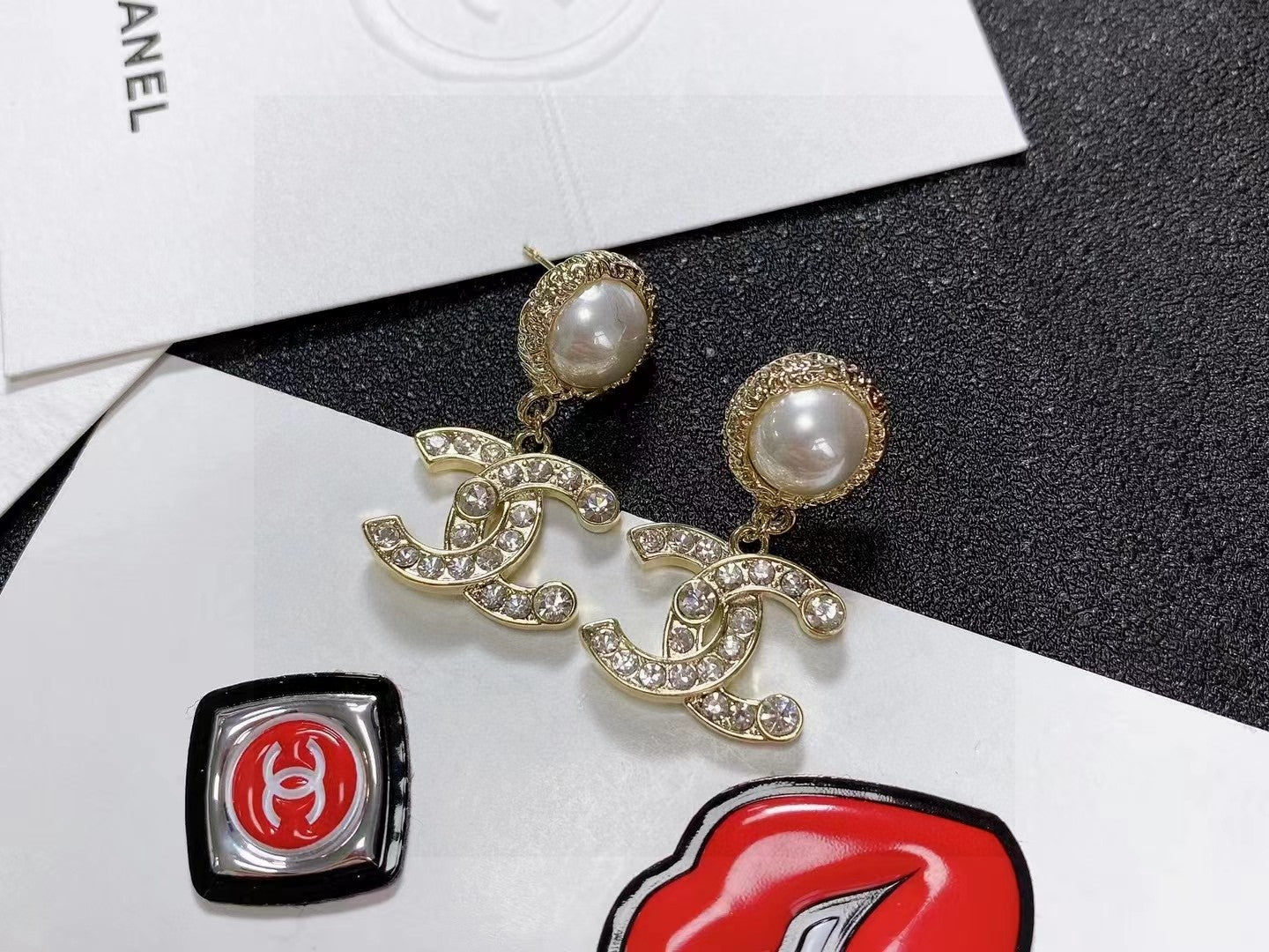 Double-C Emblem Stud Earrings in Polished Metal-Tone – Design 466 front product view
