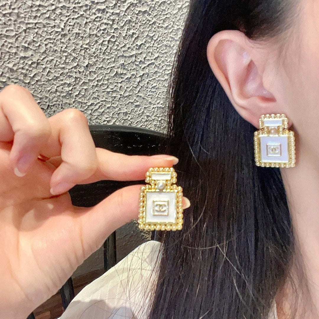 Double-C Emblem Pearl-Detail Stud Earrings – Pearl Detail – Design 026 main product view
