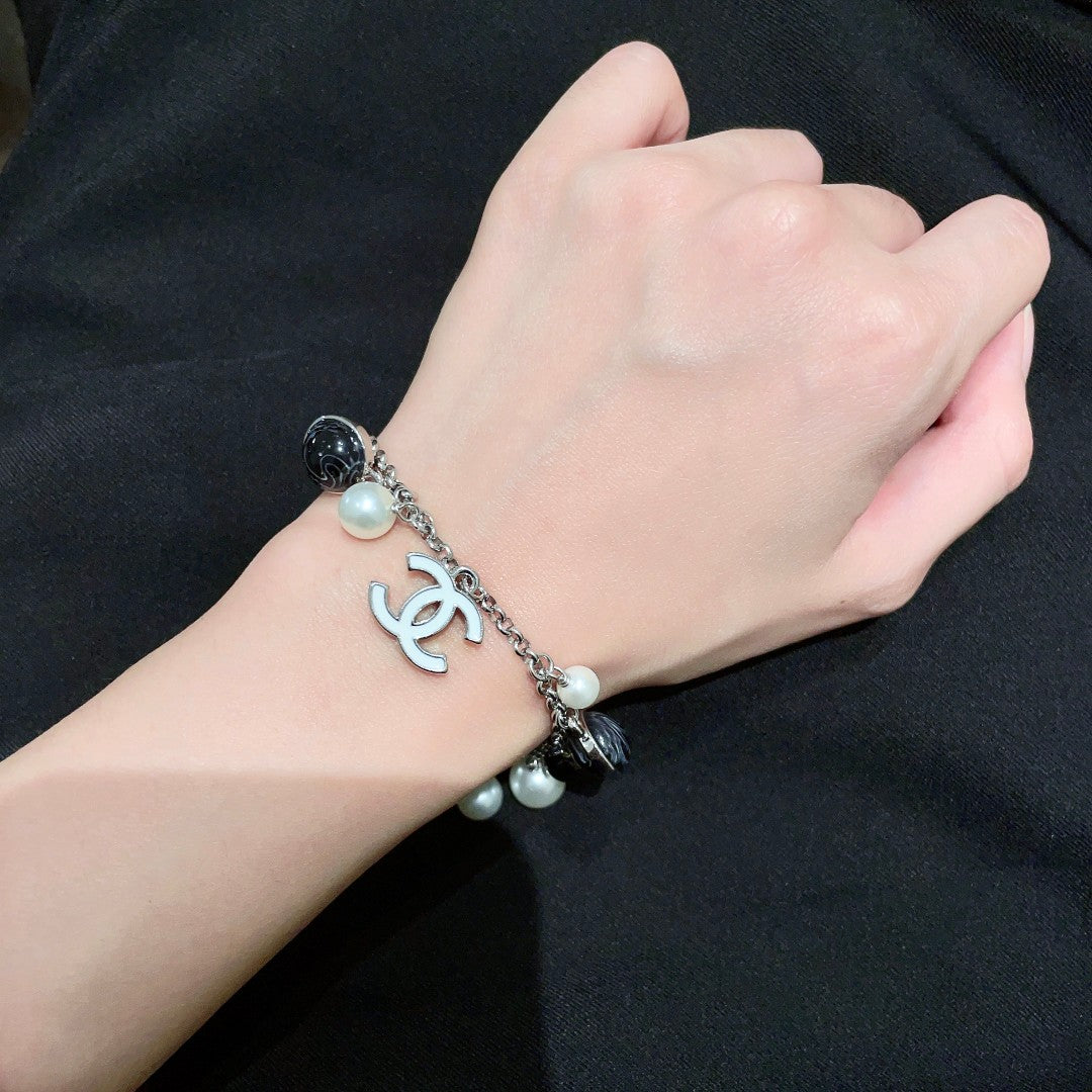 Signature Emblem Bracelet in Polished Metal-Tone – Black Detail – Design 003 main product view