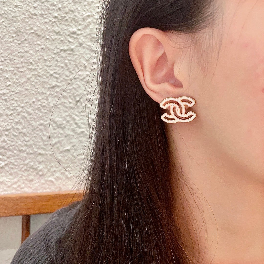 Double-C Emblem Stud Earrings in Polished Metal-Tone – Design 377 detail view