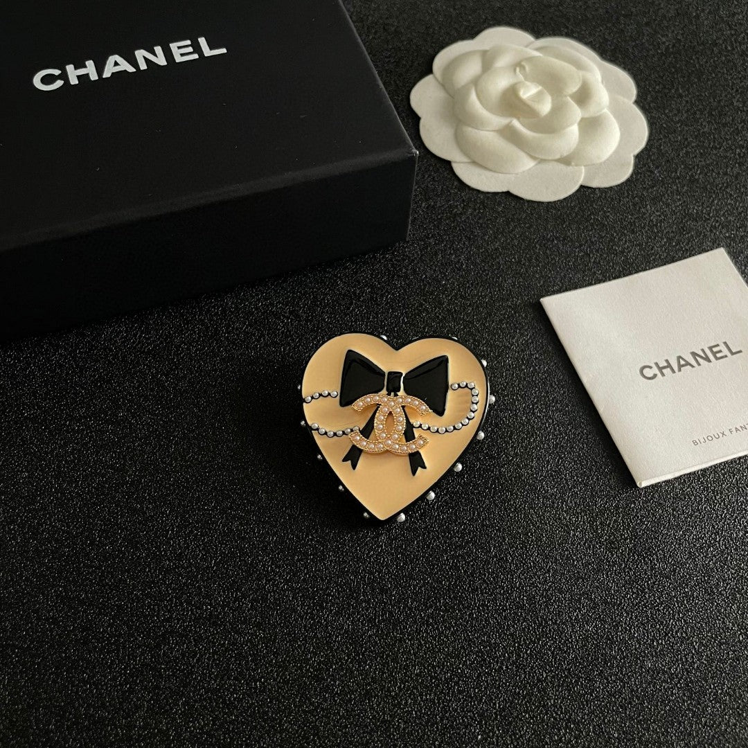 Double-C Emblem Brooch in Polished Metal-Tone – Design 074 styled product view
