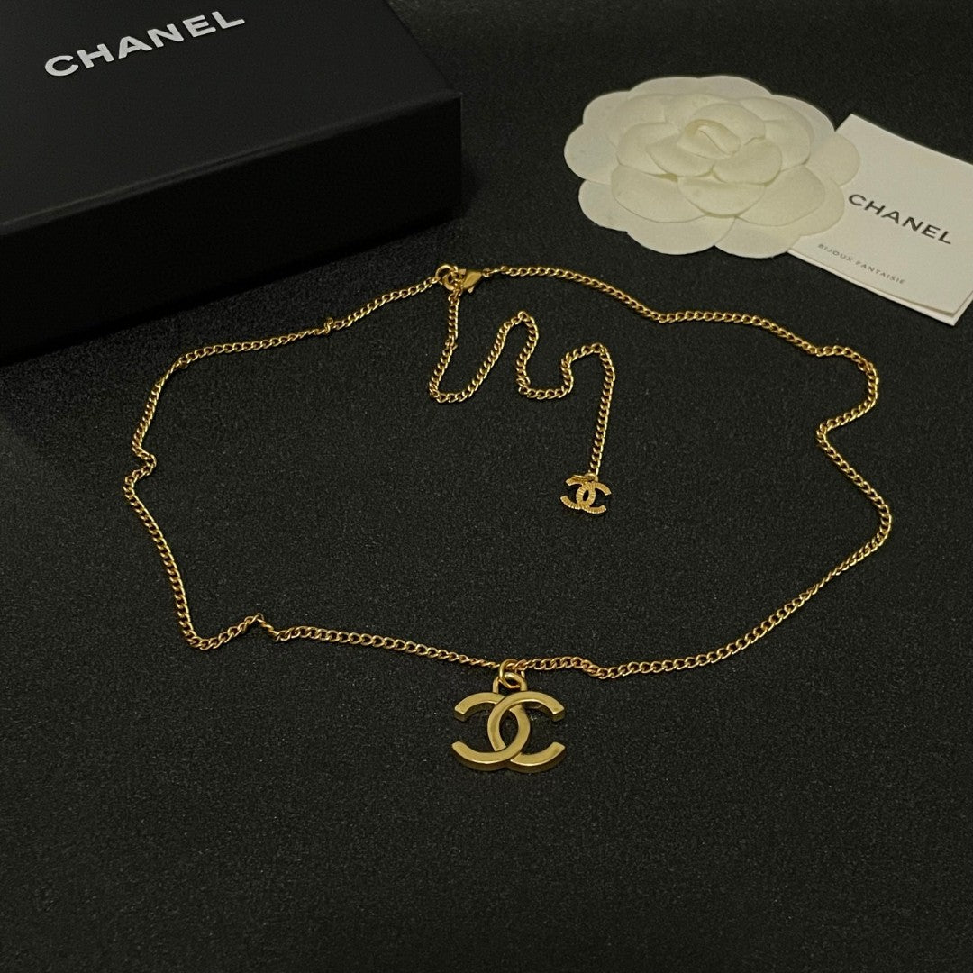Double-C Emblem Pendant Necklace in Polished Metal-Tone – Design 072 detail view