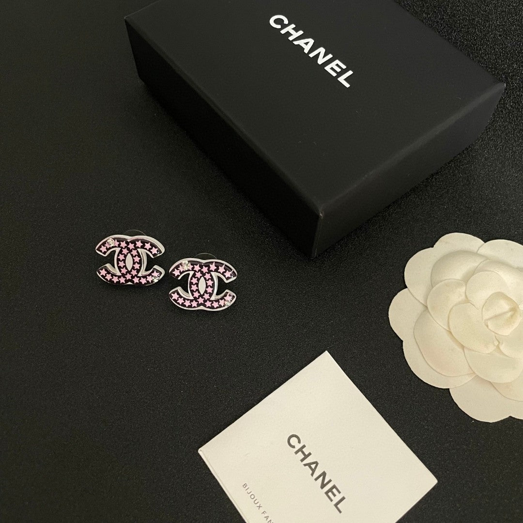 Double-C Emblem Stud Earrings in Polished Metal-Tone – Star Detail – Design 019 close-up detail
