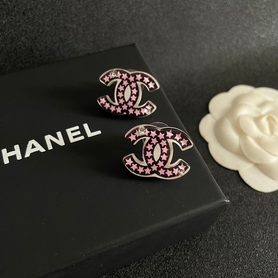 Double-C Emblem Stud Earrings in Polished Metal-Tone – Star Detail – Design 019 detail view