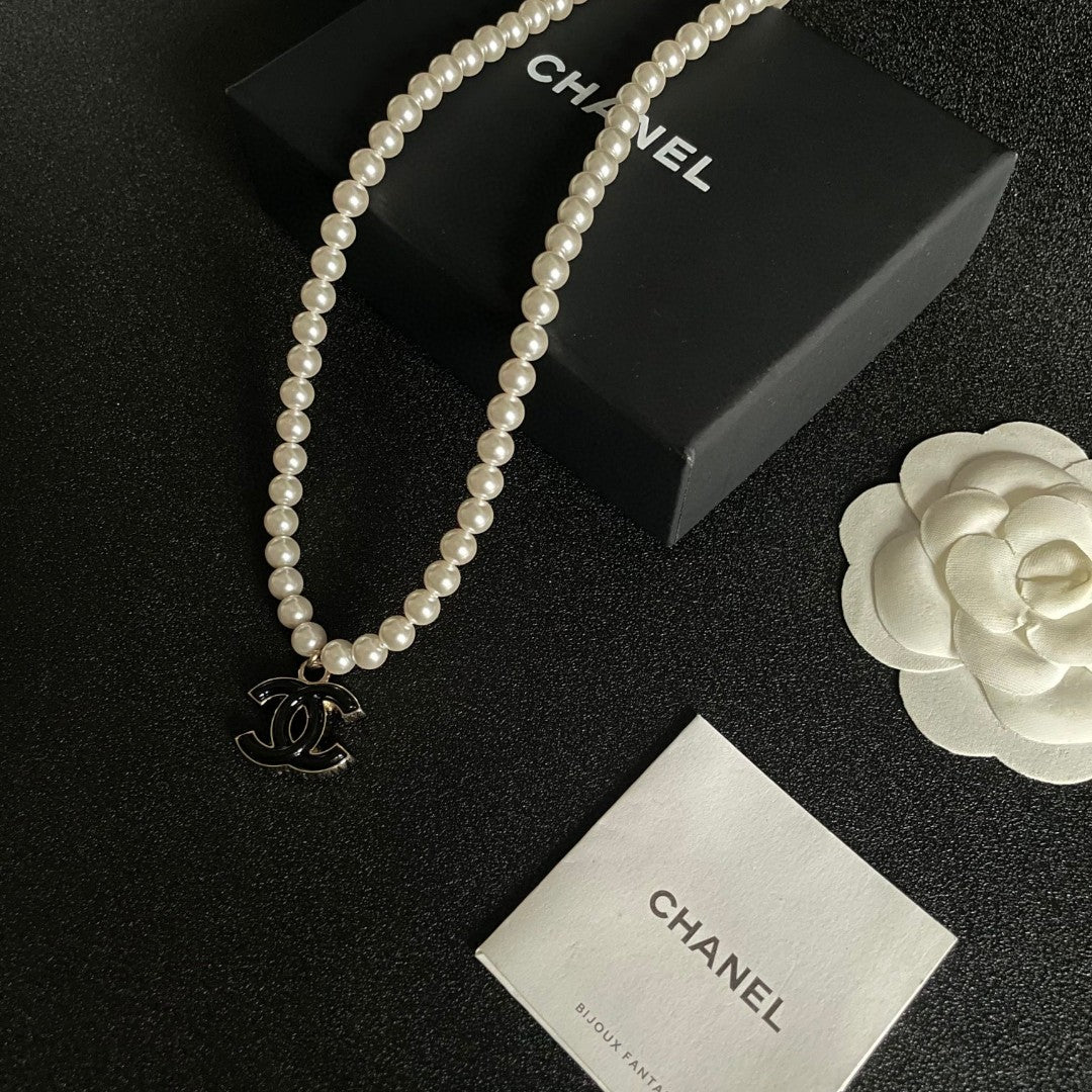 Double-C Emblem Pearl-Detail Pendant Necklace – Pearl Detail – Design 108 close-up detail