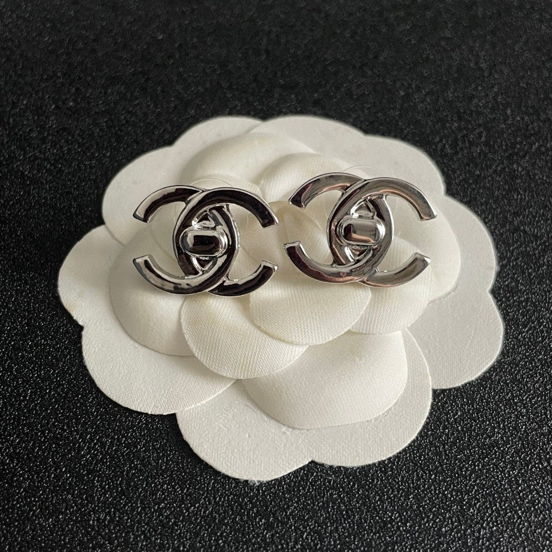 Double-C Emblem Stud Earrings in Polished Metal-Tone – Design 348 front product view