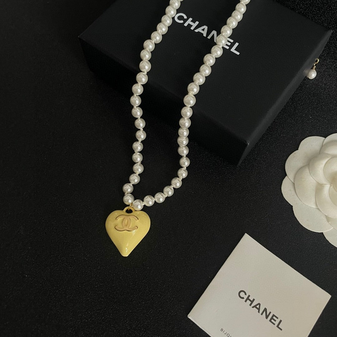 Double-C Emblem Pearl-Detail Pendant Necklace – Pearl Detail – Design 106 close-up detail