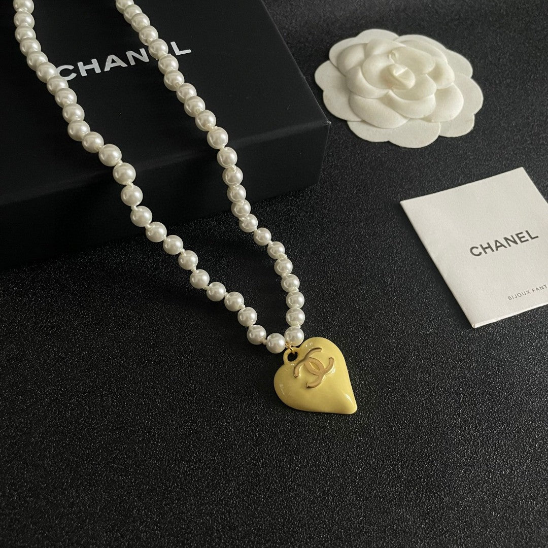 Double-C Emblem Pearl-Detail Pendant Necklace – Pearl Detail – Design 106 styled product view