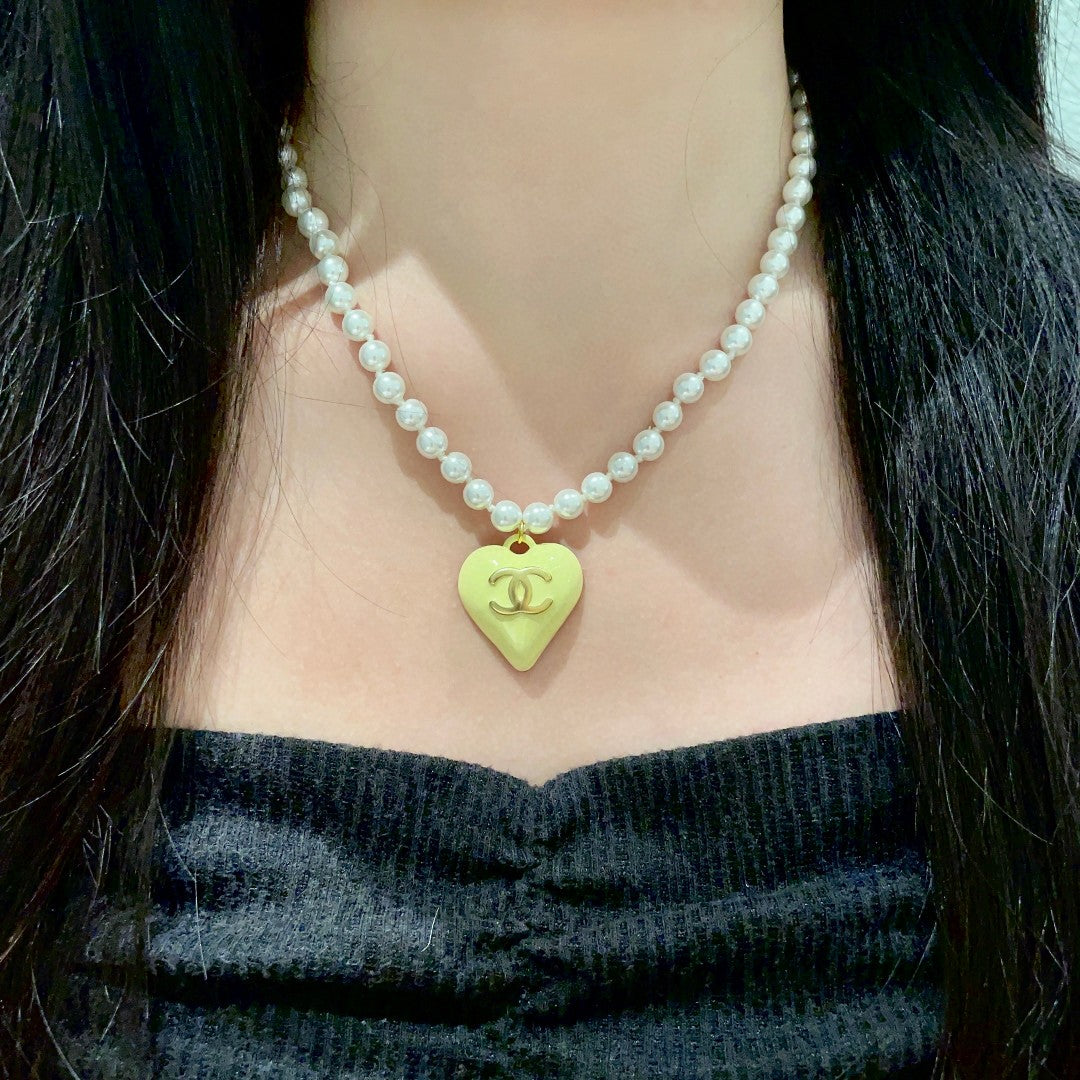 Double-C Emblem Pearl-Detail Pendant Necklace – Pearl Detail – Design 106 detail view