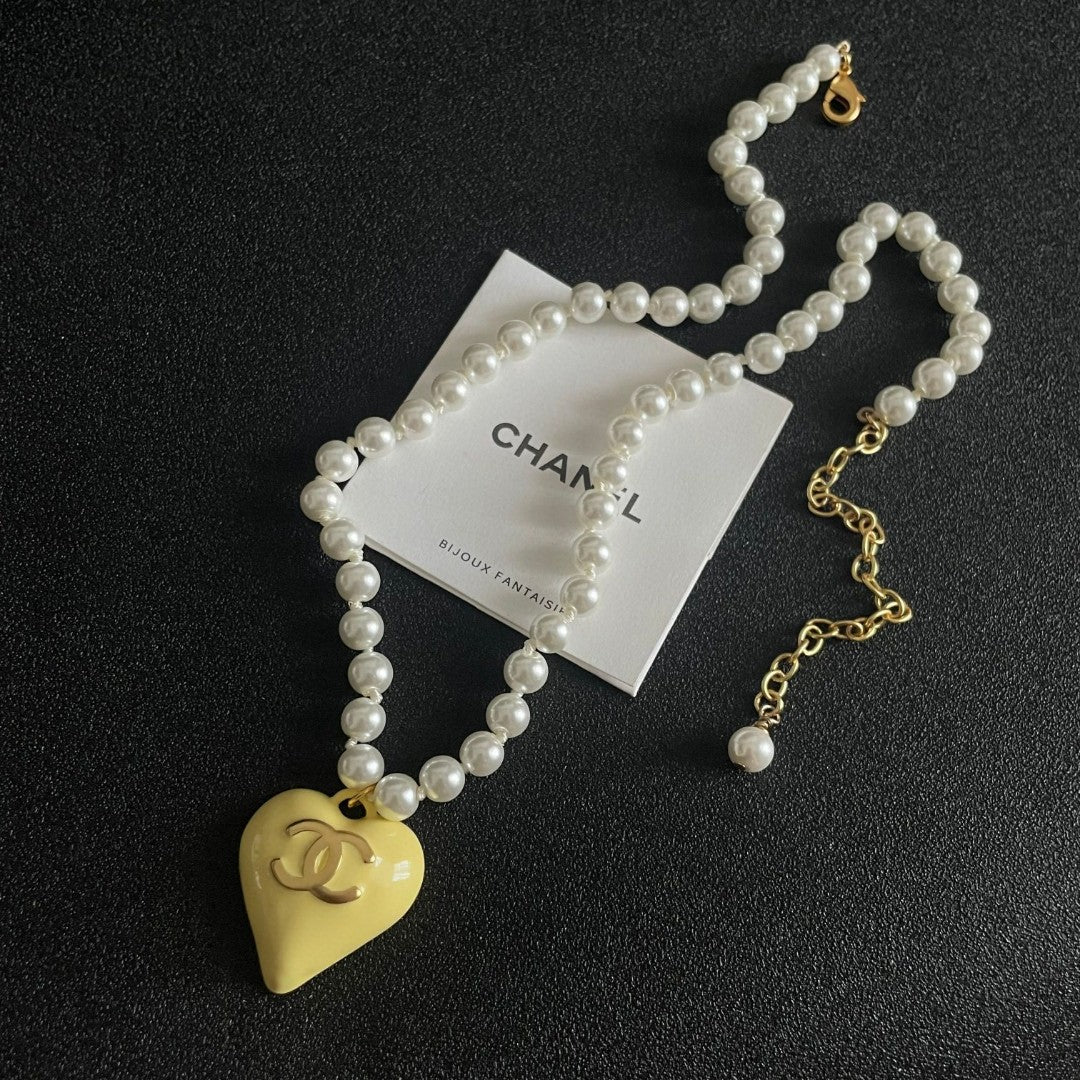 Double-C Emblem Pearl-Detail Pendant Necklace – Pearl Detail – Design 106 detail view