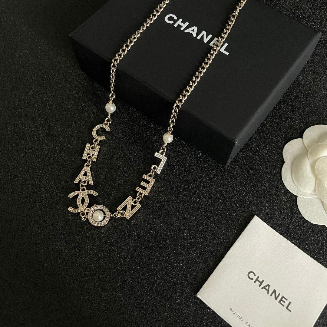 Double-C Emblem Pendant Necklace in Polished Metal-Tone – Design 055 close-up detail