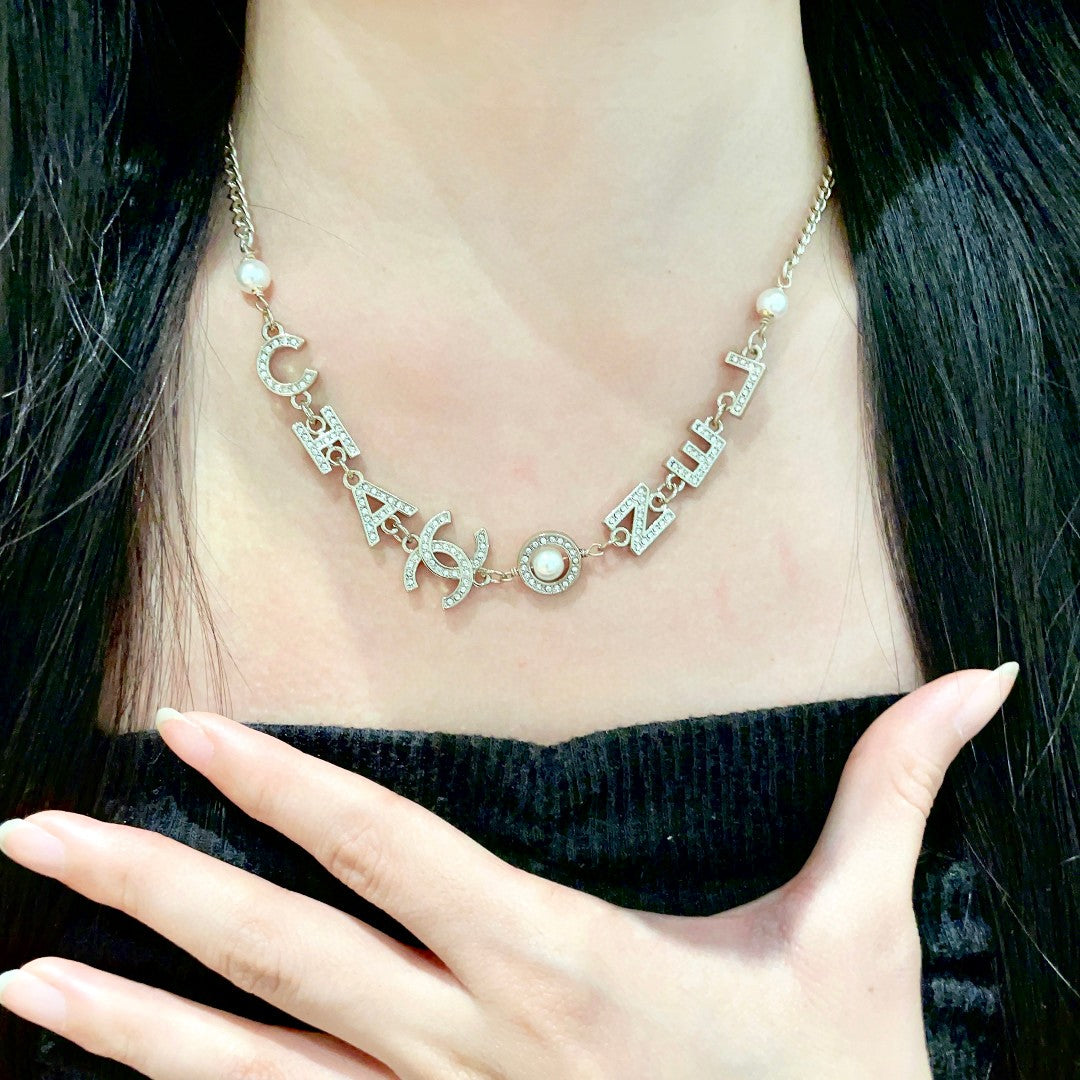 Double-C Emblem Pendant Necklace in Polished Metal-Tone – Design 055 front product view
