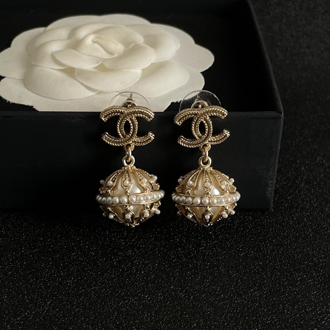 Double-C Emblem Pearl-Detail Stud Earrings – Pearl Detail – Design 020 styled product view