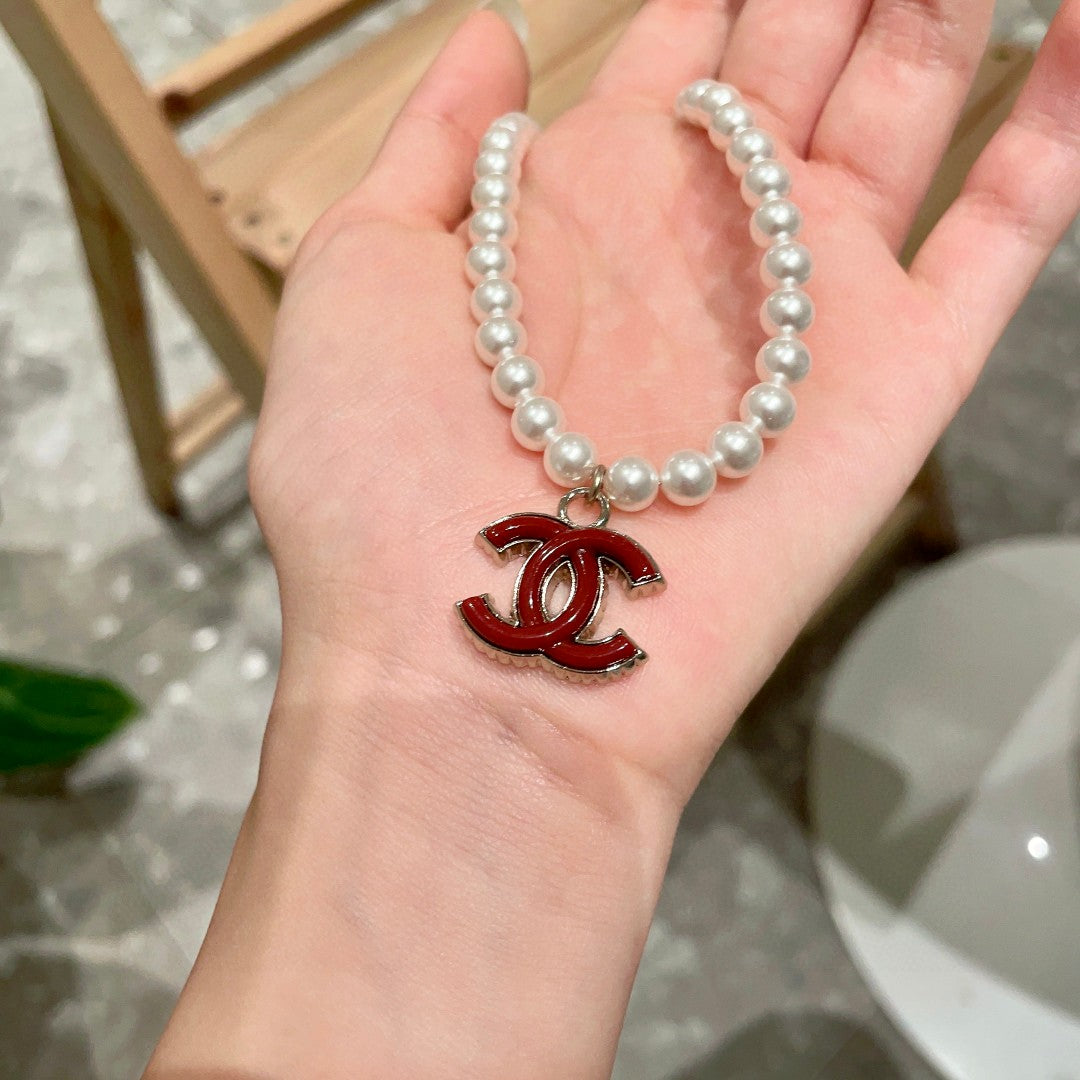 Double-C Emblem Pearl-Detail Pendant Necklace – Pearl Detail – Design 084 side detail