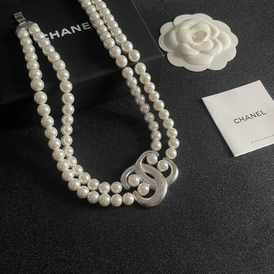Double-C Emblem Pearl-Detail Pendant Necklace – Pearl Detail – Design 075 close-up detail