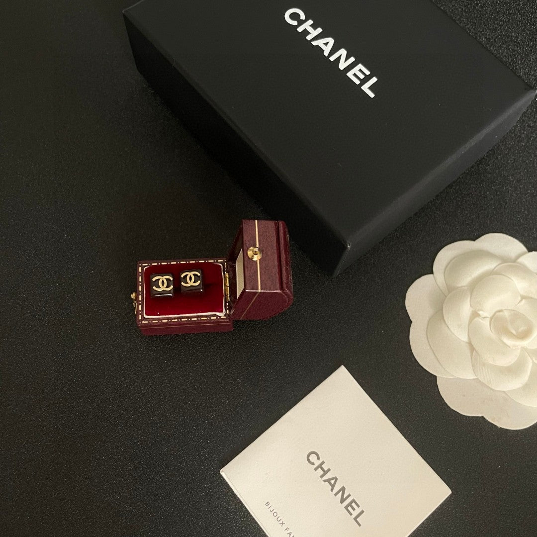 Double-C Emblem Stud Earrings in Polished Metal-Tone – Design 296 close-up detail