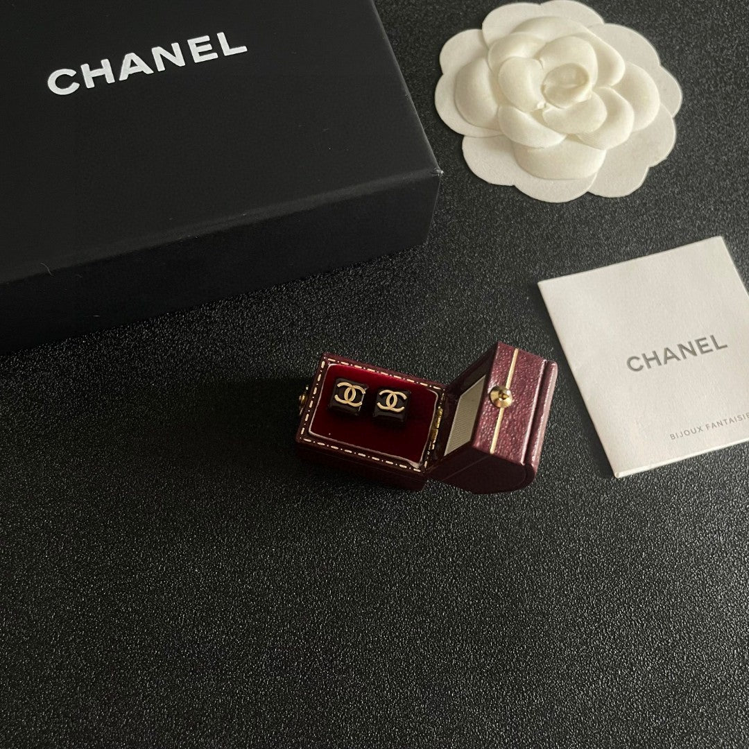 Double-C Emblem Stud Earrings in Polished Metal-Tone – Design 296 styled product view