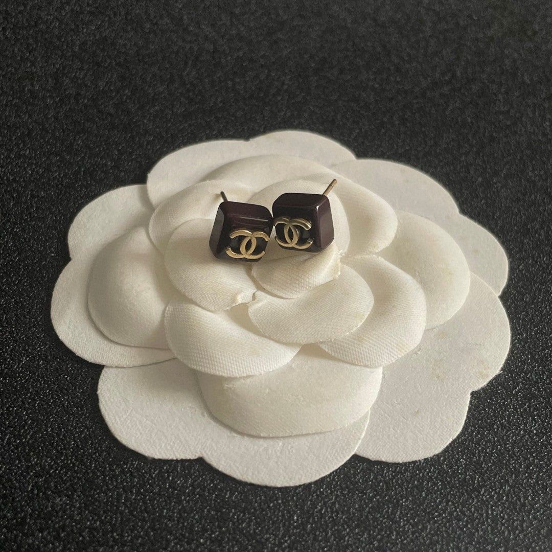 Double-C Emblem Stud Earrings in Polished Metal-Tone – Design 296 front product view