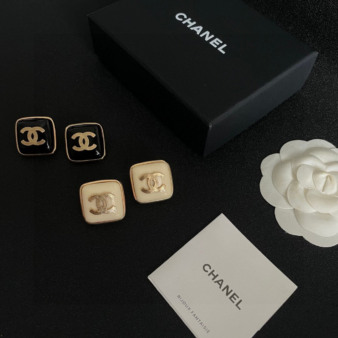 Double-C Emblem Stud Earrings in Polished Metal-Tone – Design 295 close-up detail