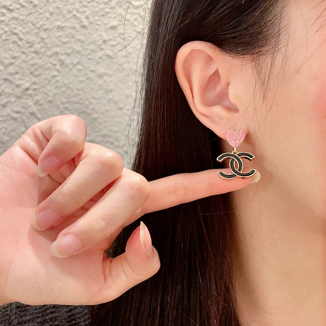 Double-C Emblem Statement Earrings in Polished Metal-Tone – Heart Detail front product view