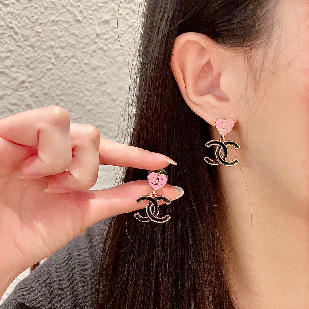 Double-C Emblem Statement Earrings in Polished Metal-Tone – Heart Detail main product view