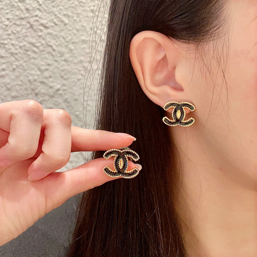 Double-C Emblem Stud Earrings in Polished Metal-Tone – Design 262 main product view