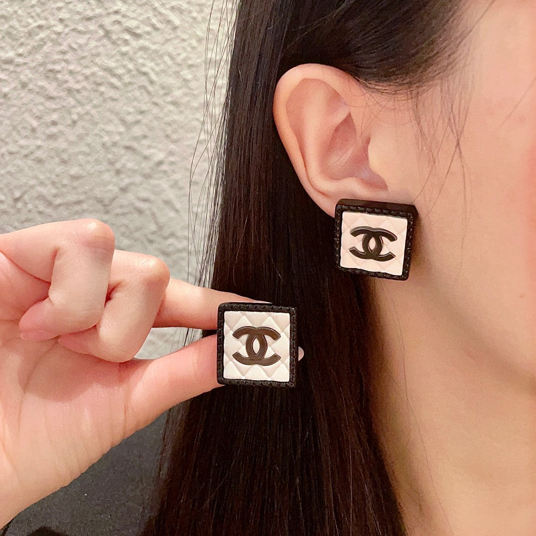 Double-C Emblem Stud Earrings in Polished Metal-Tone – Design 228 main product view