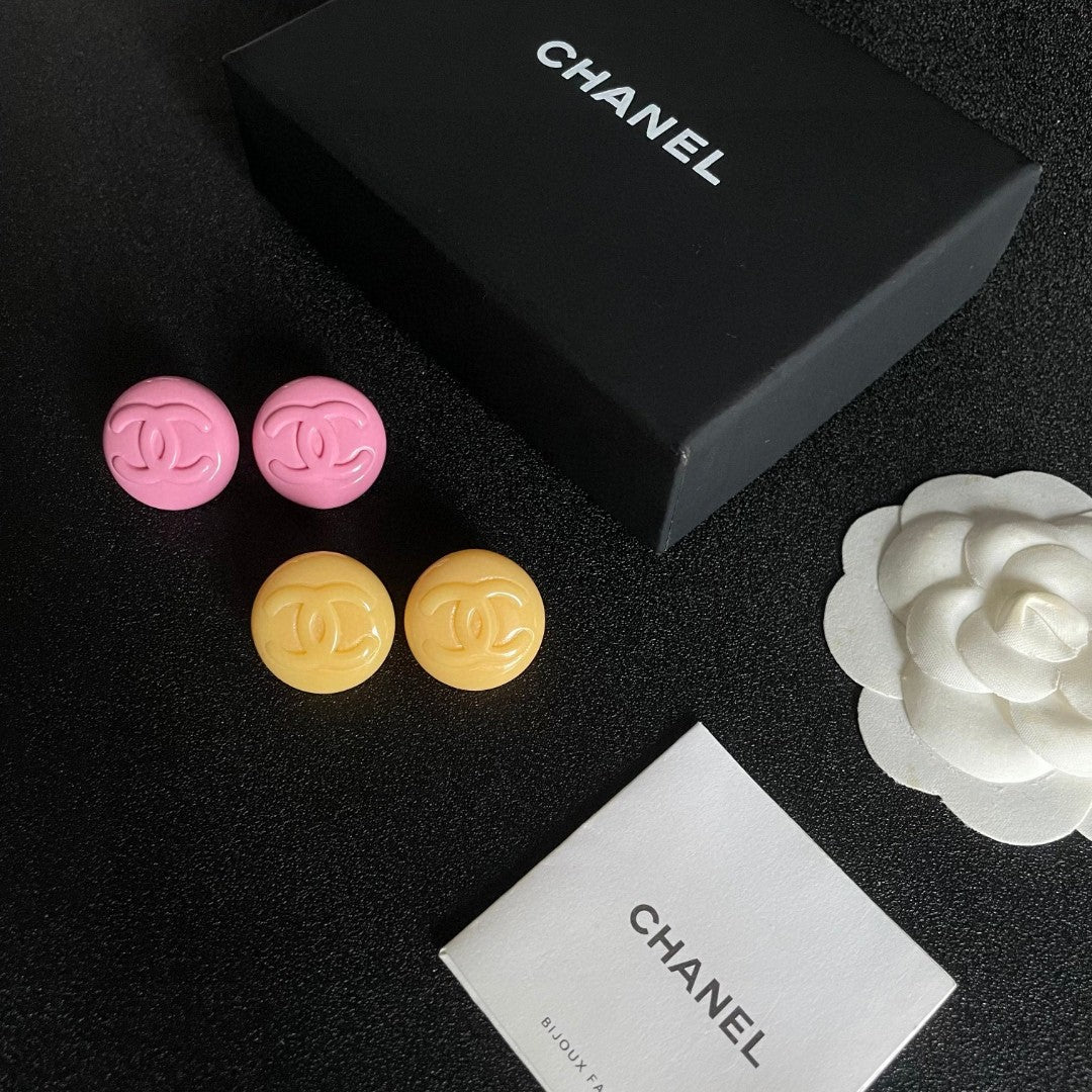Double-C Emblem Stud Earrings in Polished Metal-Tone – Design 227 close-up detail