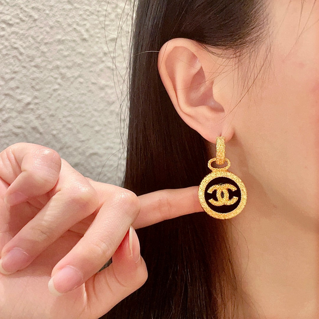 Double-C Emblem Stud Earrings in Polished Metal-Tone – Design 242 front product view