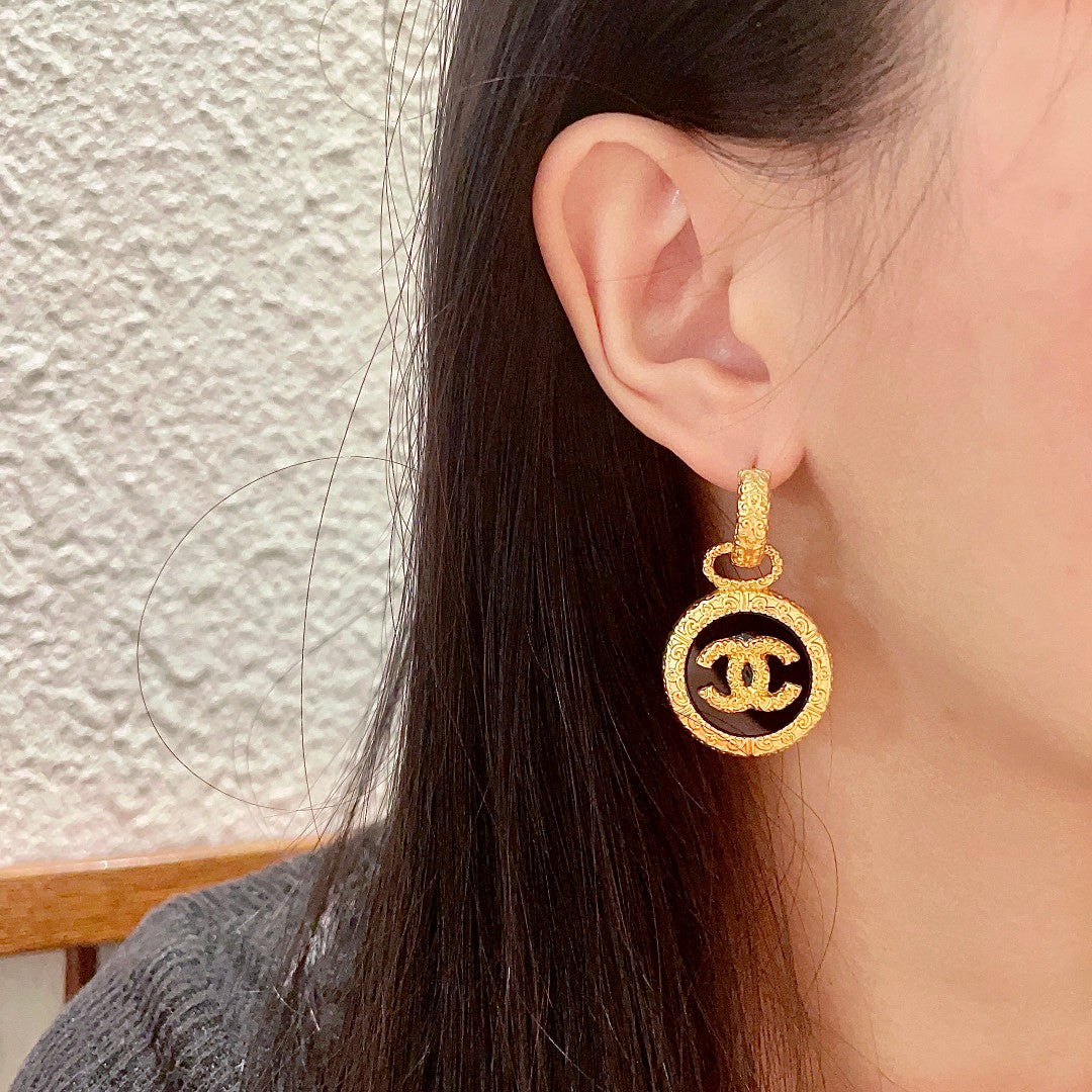 Double-C Emblem Stud Earrings in Polished Metal-Tone – Design 242 detail view