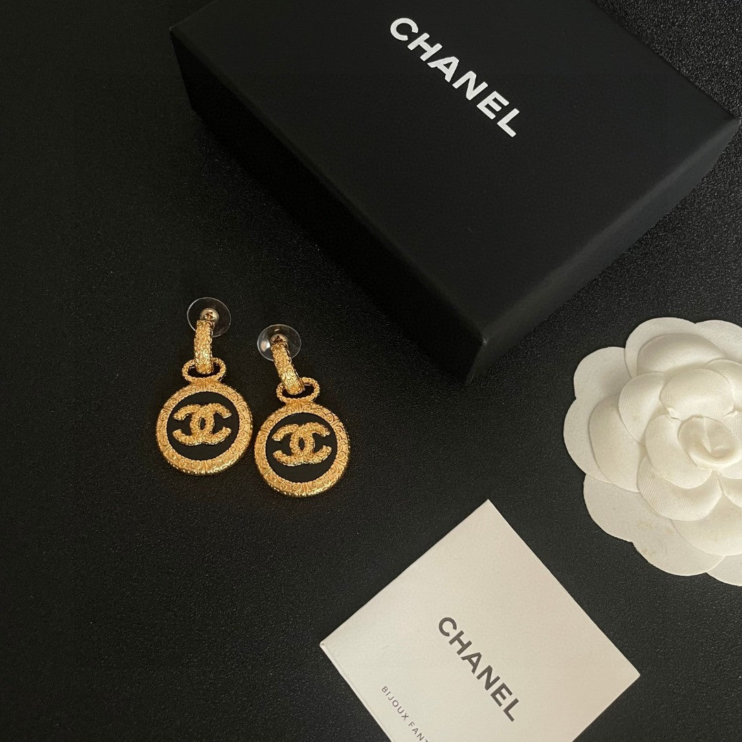 Double-C Emblem Stud Earrings in Polished Metal-Tone – Design 242 close-up detail