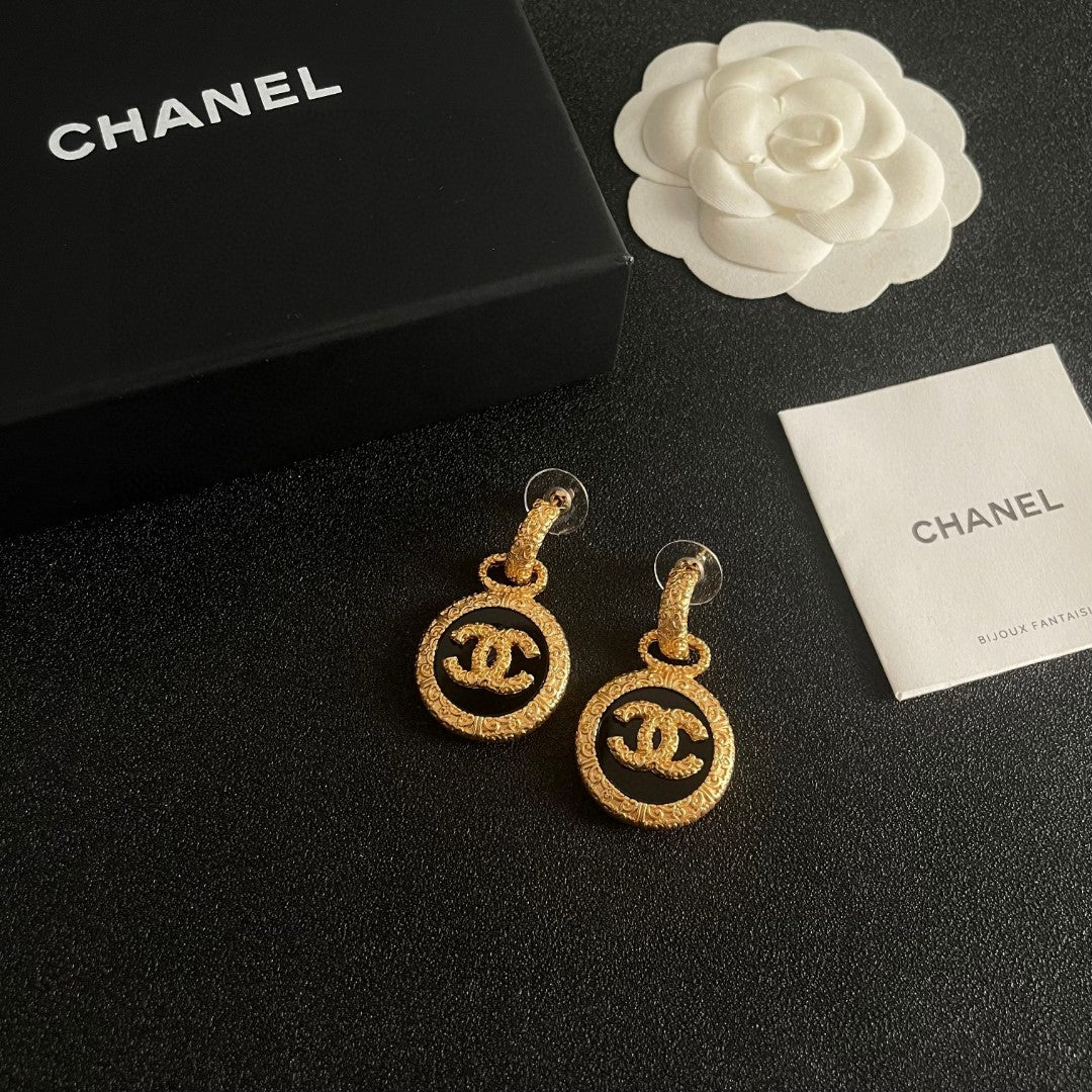 Double-C Emblem Stud Earrings in Polished Metal-Tone – Design 242 styled product view