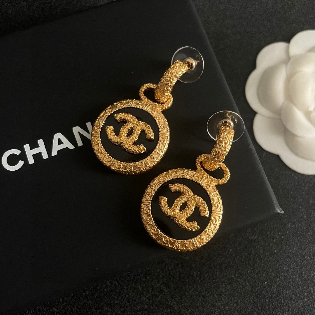 Double-C Emblem Stud Earrings in Polished Metal-Tone – Design 242 detail view