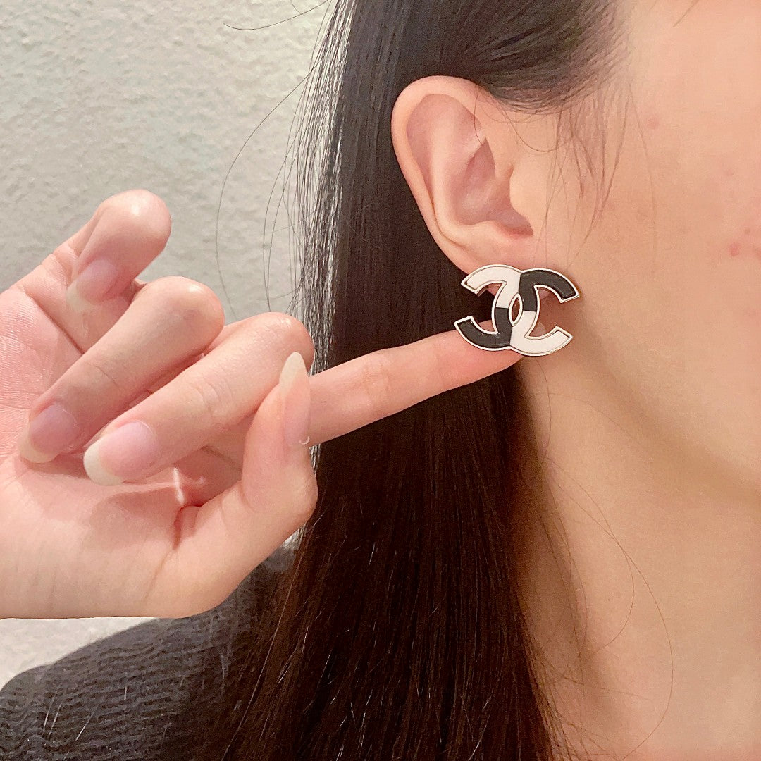 Double-C Emblem Stud Earrings in Polished Metal-Tone – Design 240 front product view