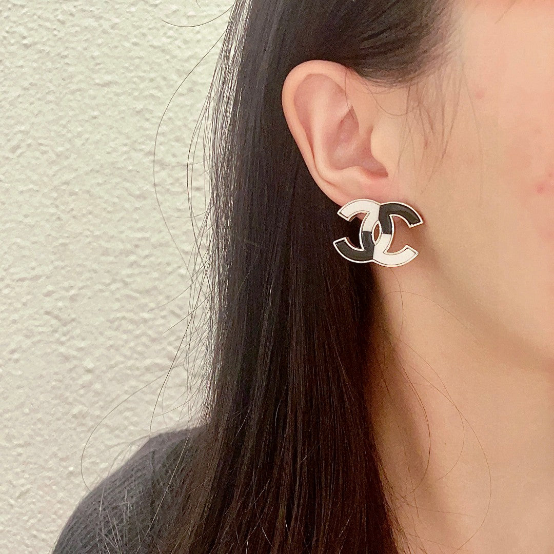 Double-C Emblem Stud Earrings in Polished Metal-Tone – Design 240 detail view
